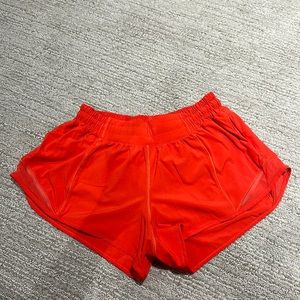 Luulemon size 6 orange hotty hot short 2.5 inch